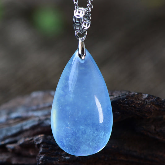 A natural aquamarine stone from the front